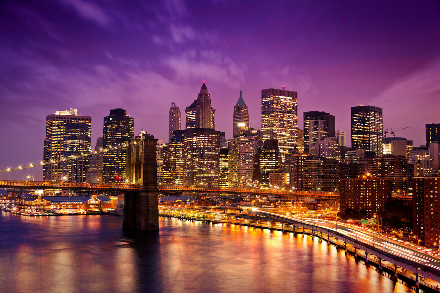 Stock photo of New York (night view of Manhattan with Brooklyn Bridge)